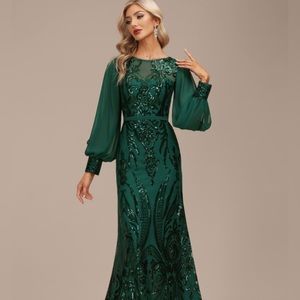 Green beaded gown from JJ’s House. Size US2